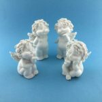 TIJD. UITV. Igor engel kussend  9-12 cm