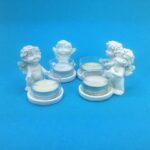 Igor engel met wax. lichtje glas 6-9 cm..ass.